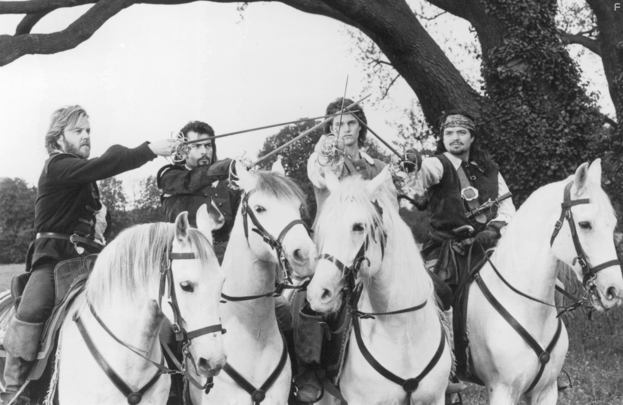Charlie Sheen, Chris O'Donnell, Kiefer Sutherland, and Oliver Platt in Три мушкетера (1993)
