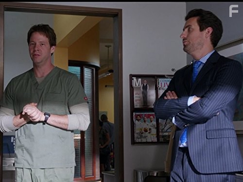 Ike Barinholtz and Ed Weeks in Проект Минди (2012)