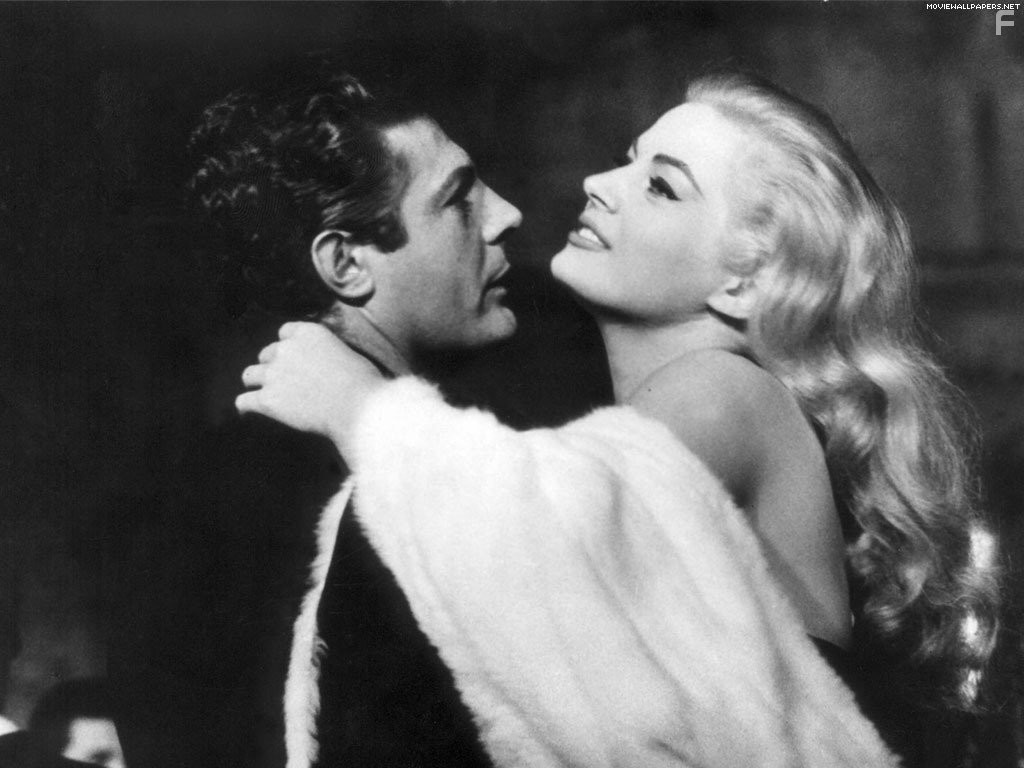 Marcello Mastroianni and Anita Ekberg in Сладкая жизнь (1960)