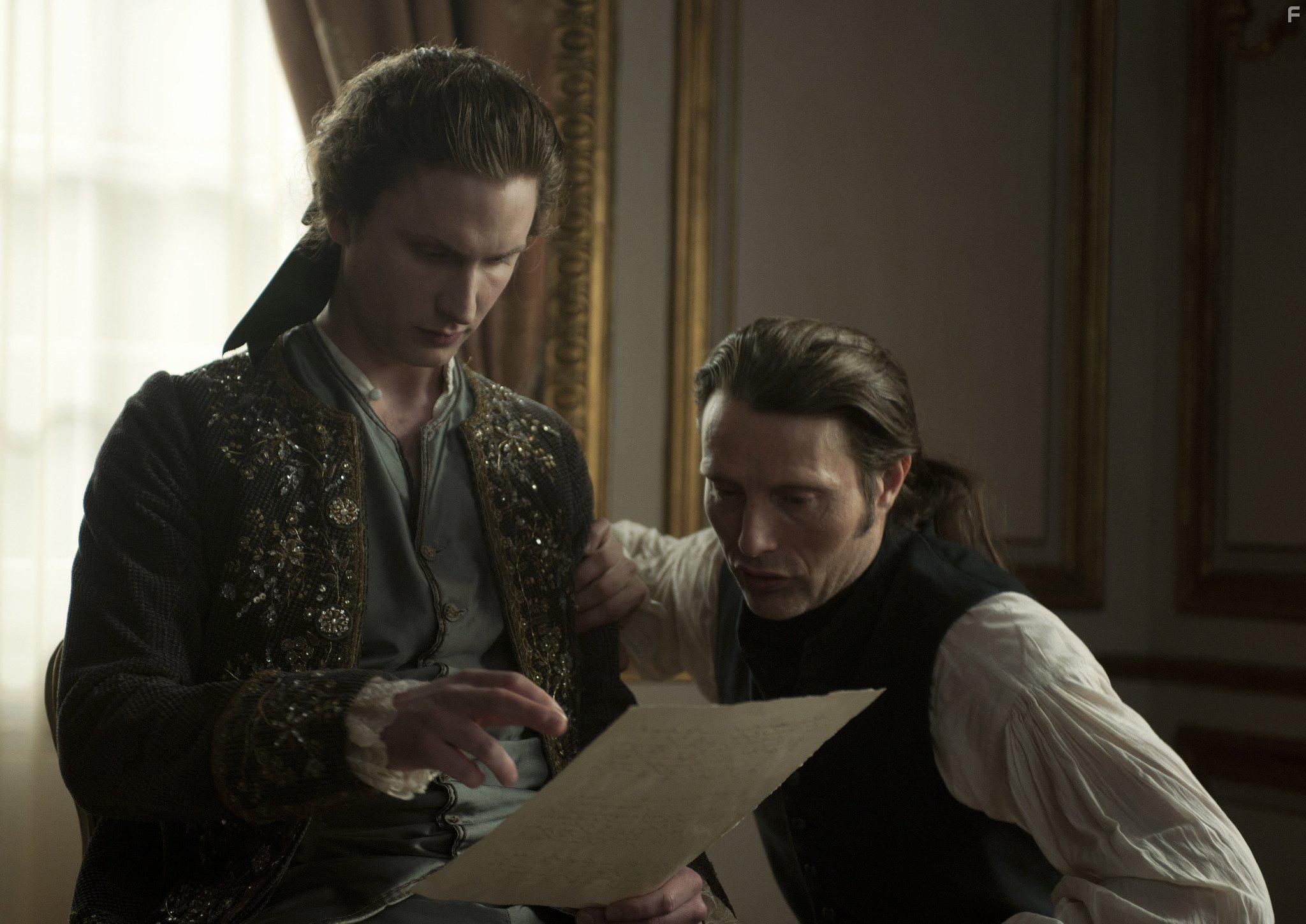 Mads Mikkelsen and Mikkel Boe Flsgaard in En kongelig affre (2012)