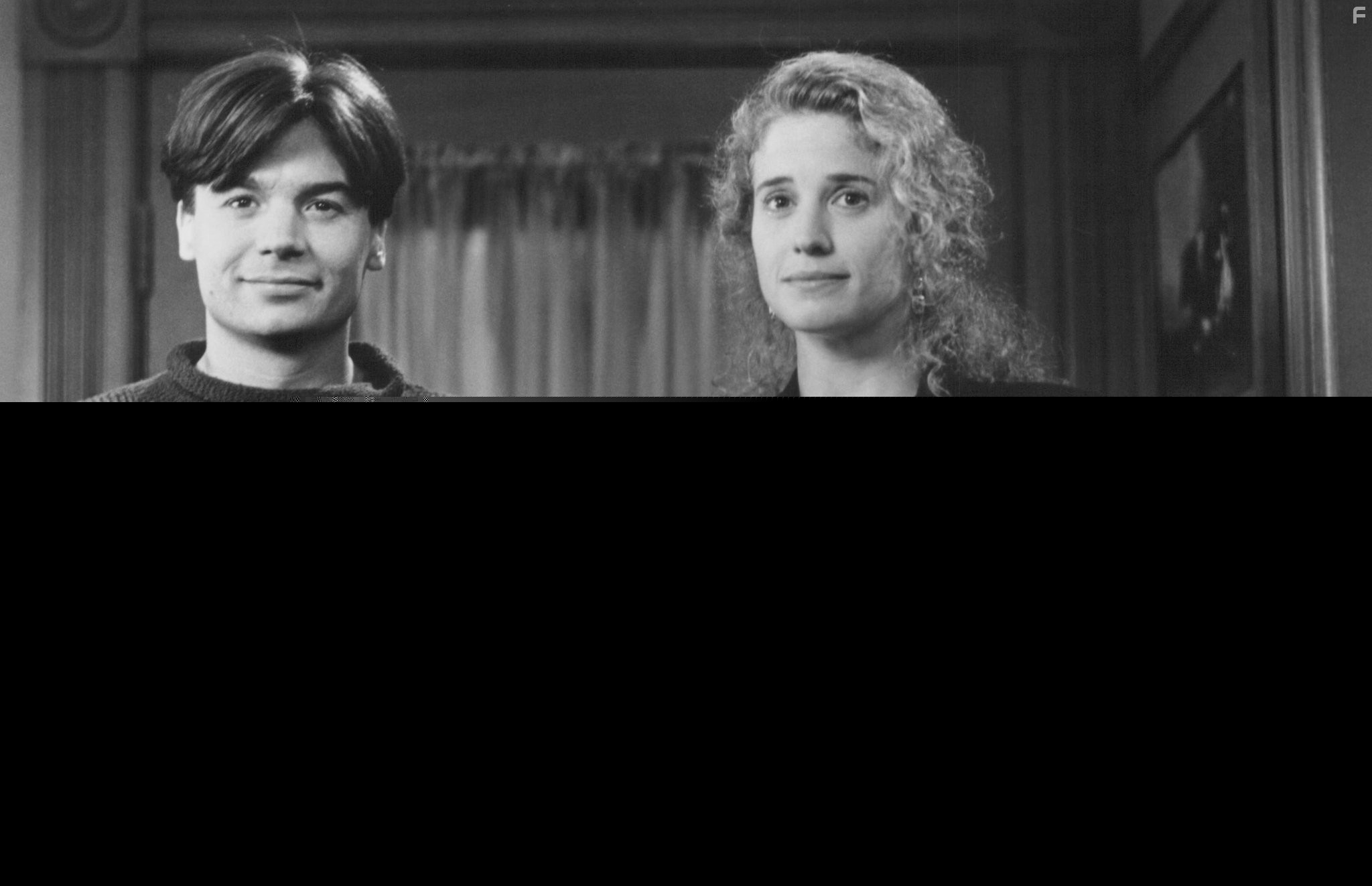 Mike Myers and Nancy Travis in Я женился на убийце с топором (1993)
