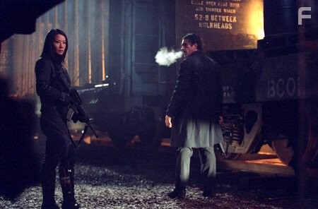 (L-R) LUCY LIU and ANTONIO BANDERAS star in the explosive action adventure "Ballistic: Ecks vs. Sever," a Warner Bros. Pictures release.