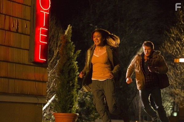 Holly Elissa and Chad Krowchuk in Collision Earth (2011)