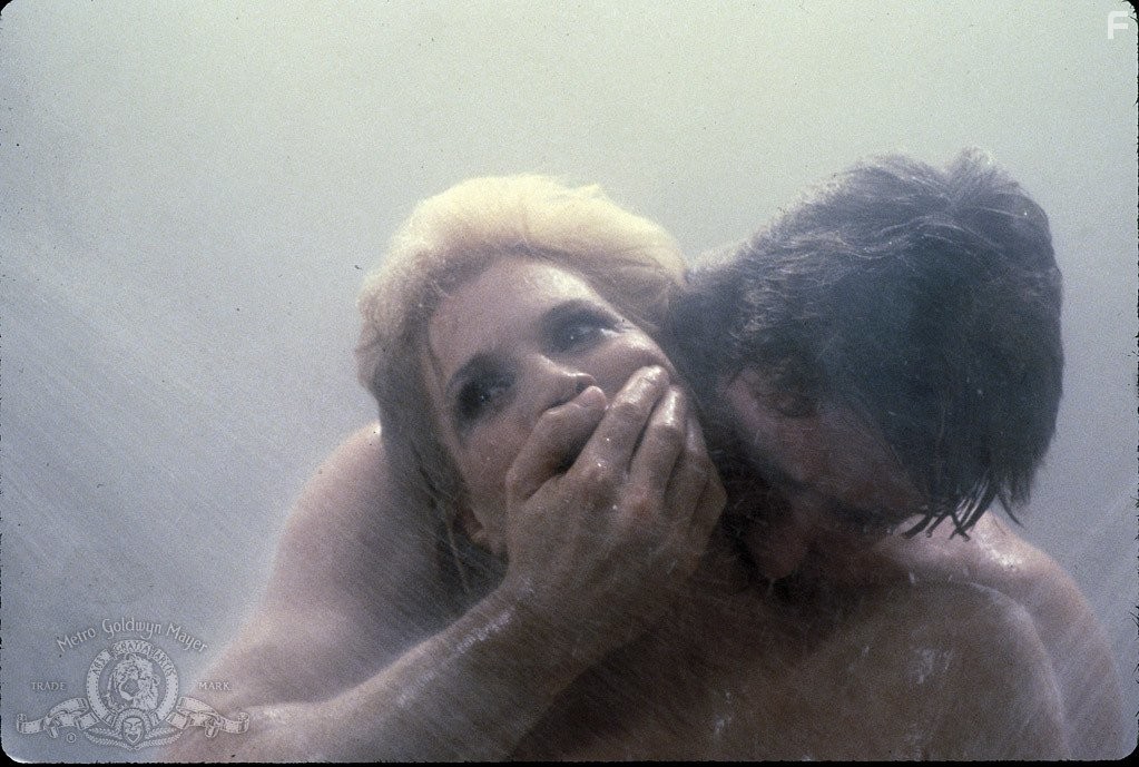 Angie Dickinson and Robbie L. McDermott in Бритва (1980)