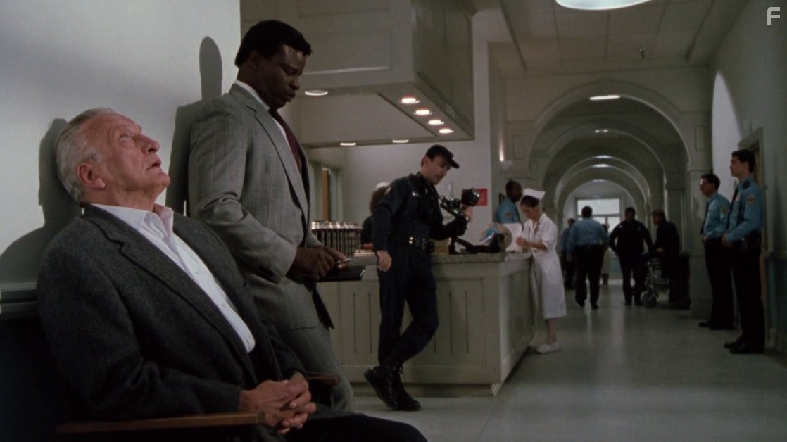 George C. Scott and Grand L. Bush in Изгоняющий дьявола III (1990)