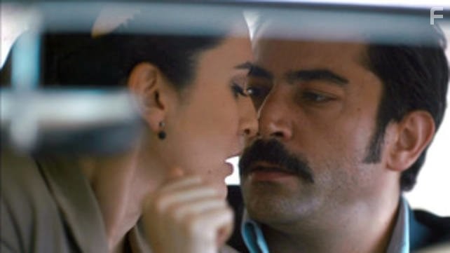Kenan Imirzalioglu and Berg?zar Korel in Дядя Кара (2012)