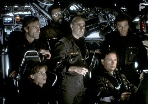(Beginning lower left and clockwise) Hilary Swank as Beck, Aaron Eckhart as Josh, Delroy Lindo as Brazzleton, Stanley Tucci as Zimsky, Bruce Greenwood as Richard, and Tchely Karyo as Serge.