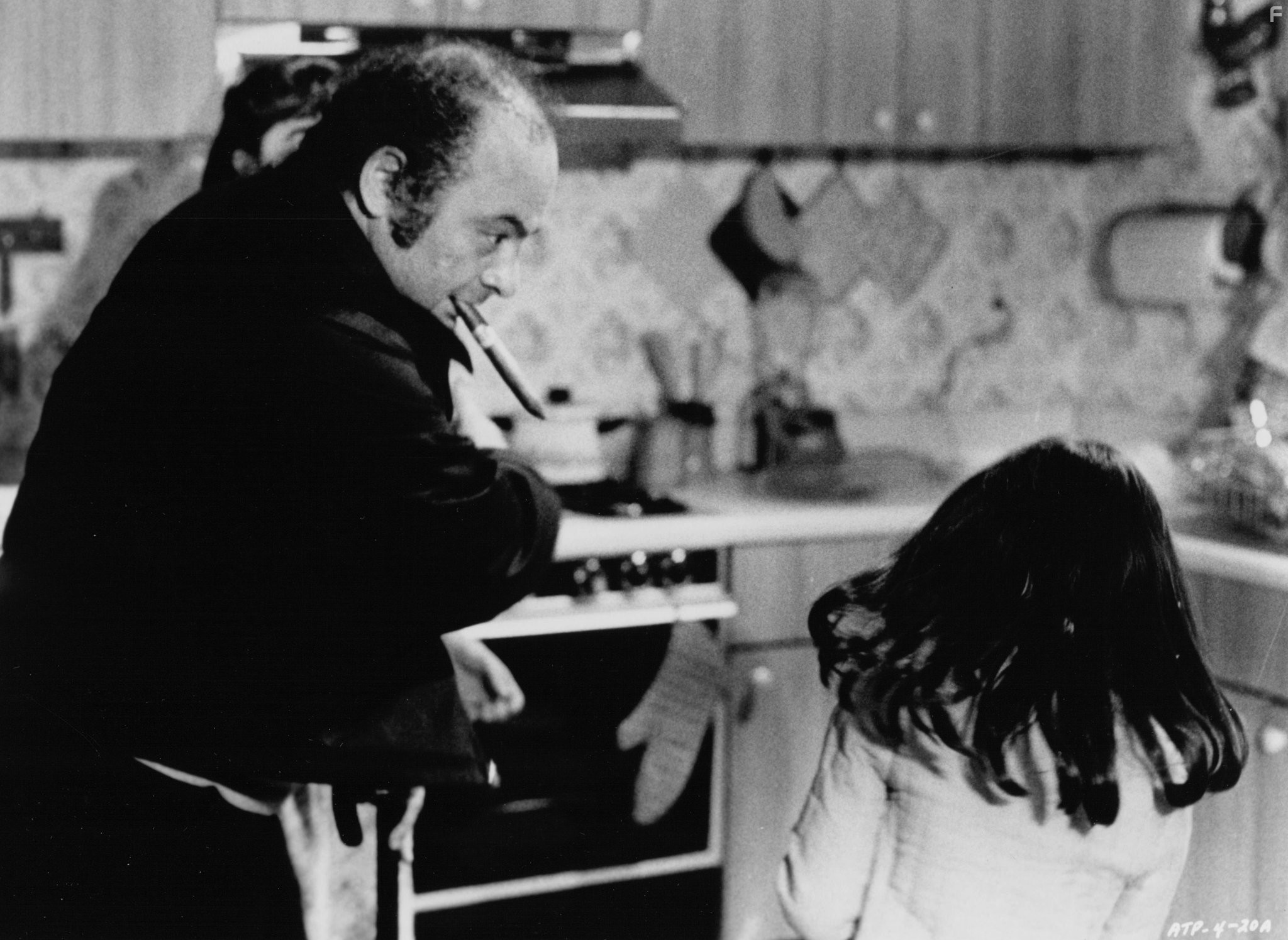 Erika Katz and Burt Young in Амитивилль 2: Одержимость (1982)