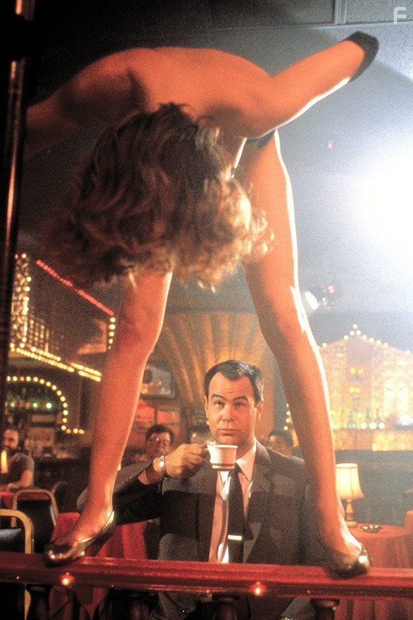 Dan Aykroyd and Susan Deemer in Сети зла (1987)