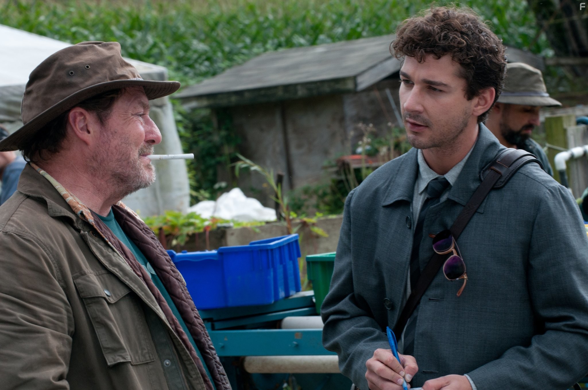 Shia LaBeouf and Stephen Root in Грязные игры (2012)