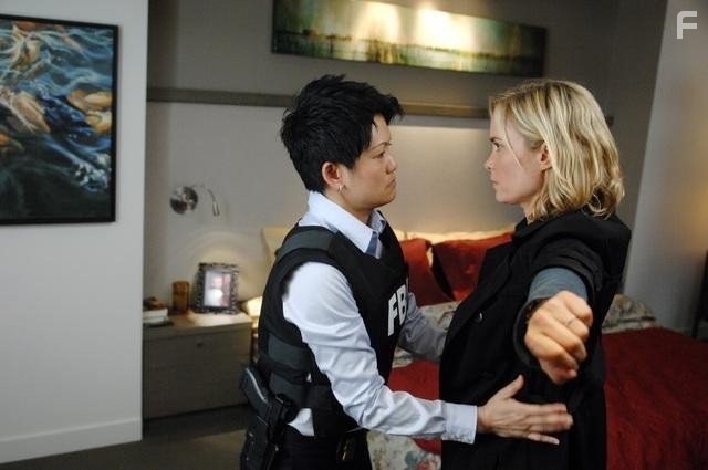 Leanne Adachi and Radha Mitchell in Красная вдова (2013)