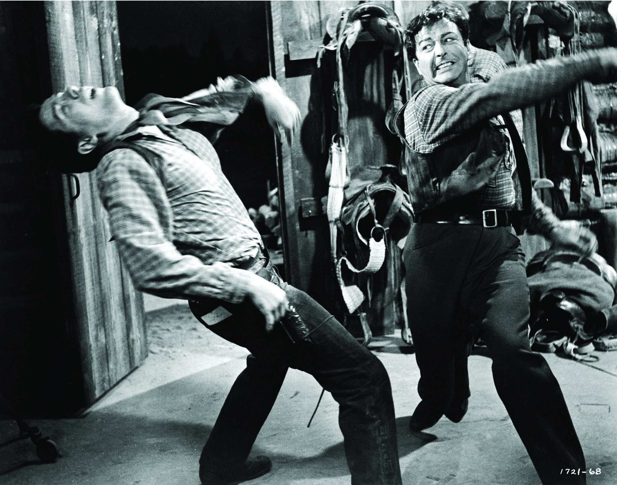 John Cassavetes and Robert Taylor in Saddle the Wind (1958)