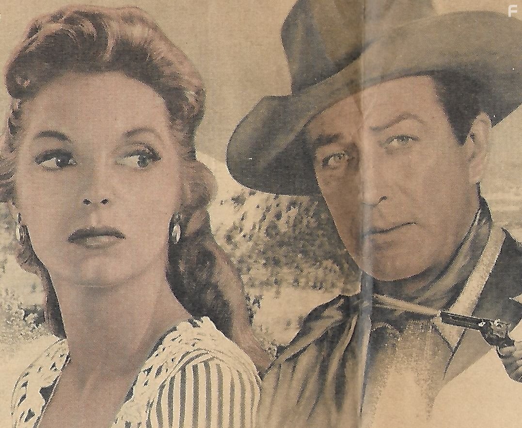 Robert Taylor and Julie London in Saddle the Wind (1958)