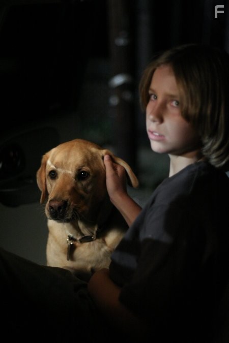 Alec Hogan as Alex Cabot and Roman as Bailey Cabot.