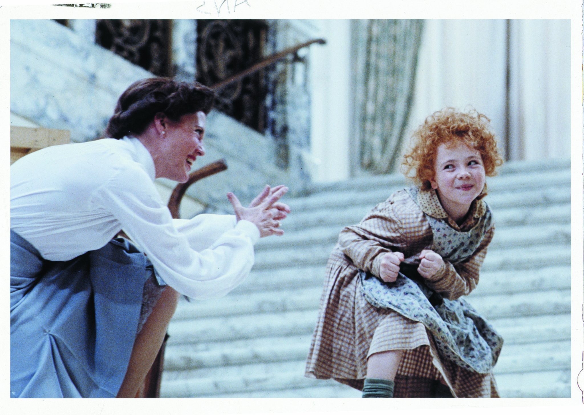 Aileen Quinn and Ann Reinking in Энни (1982)