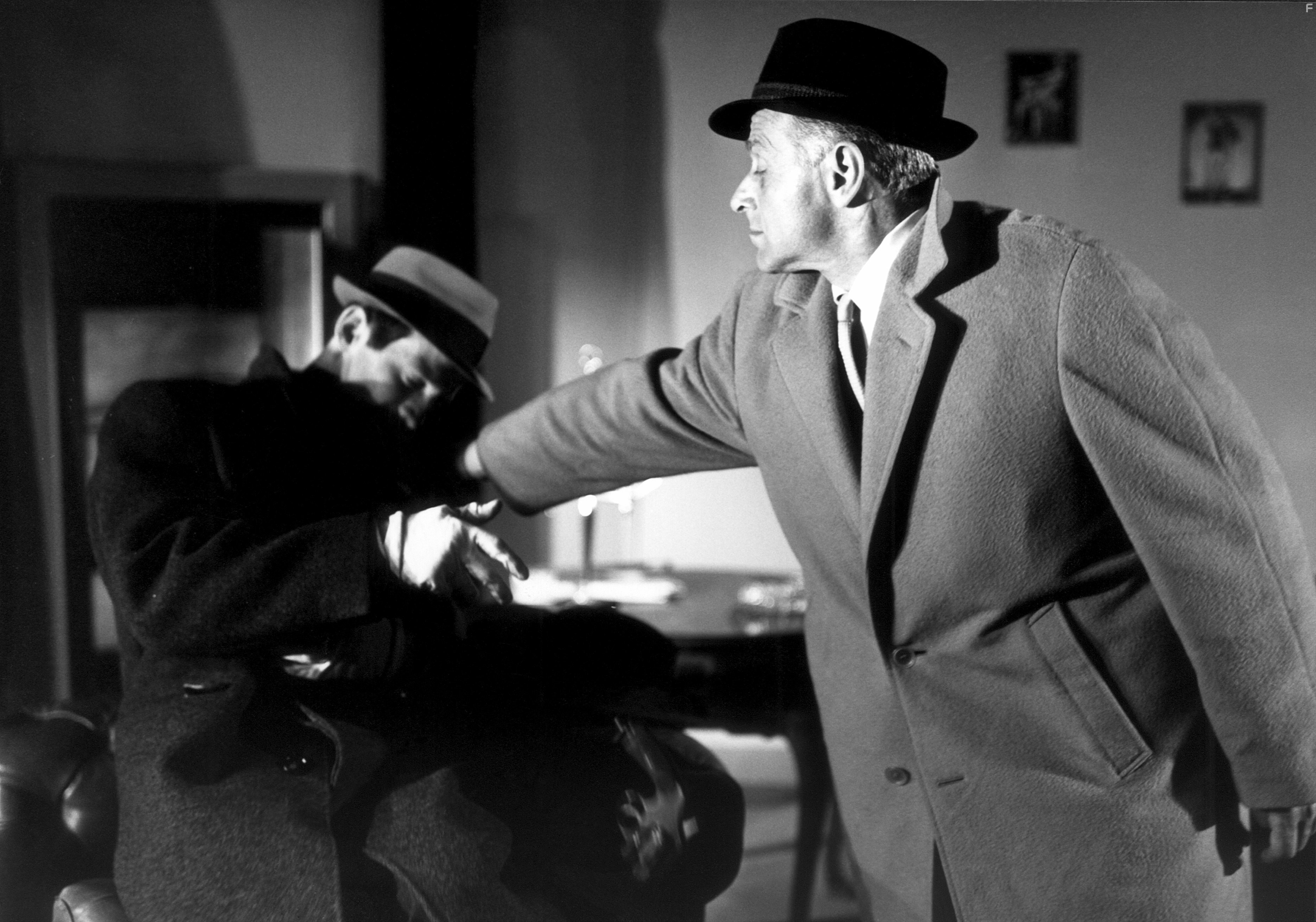 Jean-Paul Belmondo and Jacques De Leon in Стукач (1962)