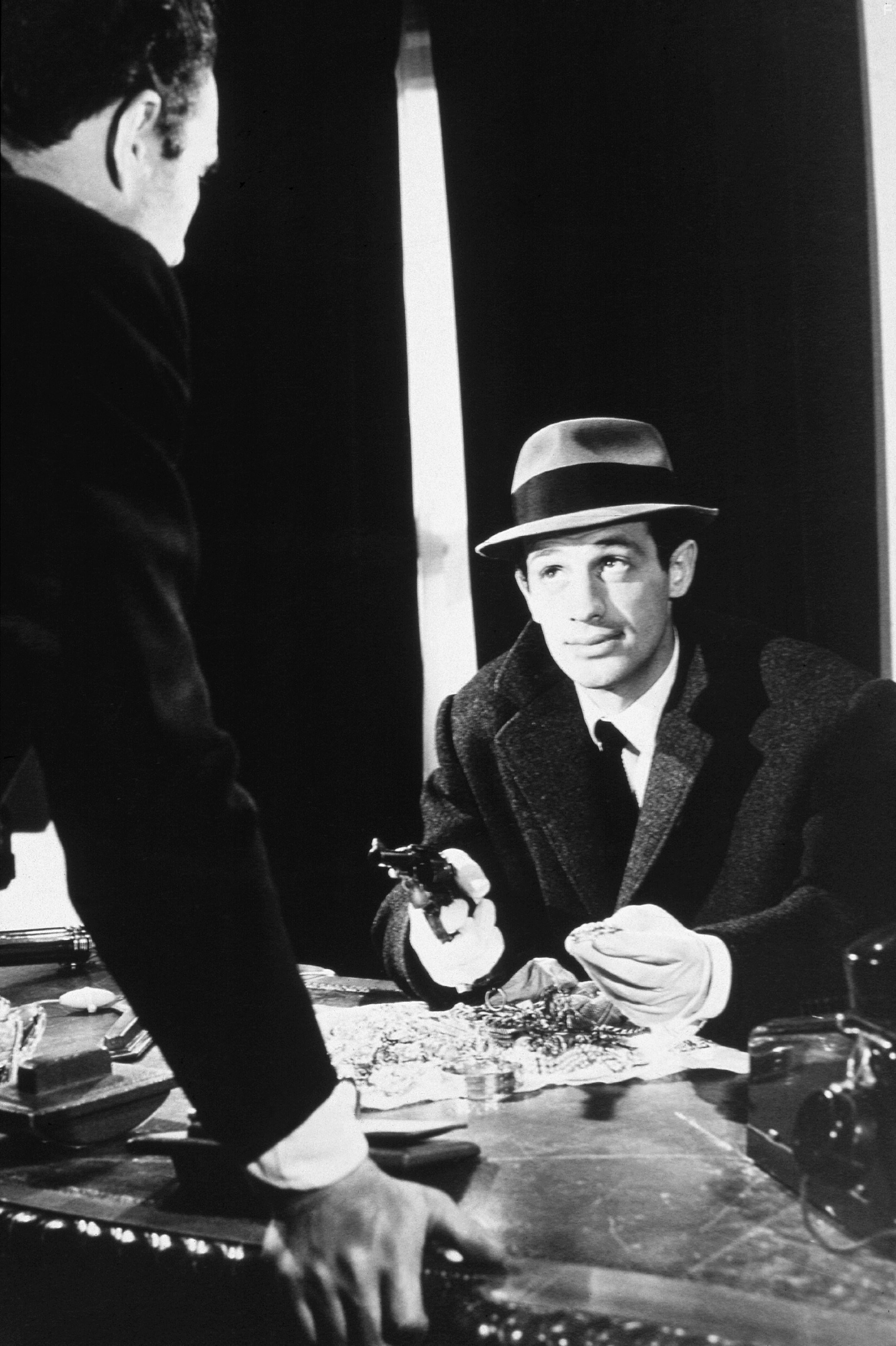 Jean-Paul Belmondo and Michel Piccoli in Стукач (1962)