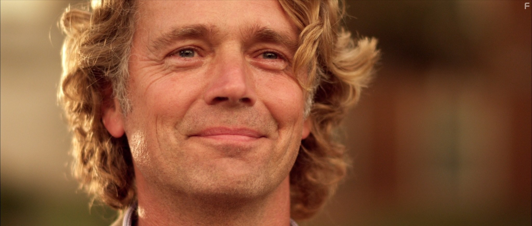 John Schneider in Дитя октября (2011)