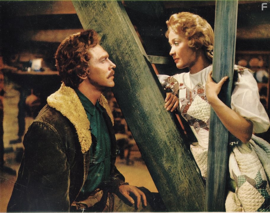 Jane Powell and Howard Keel in Семь невест для семи братьев (1954)