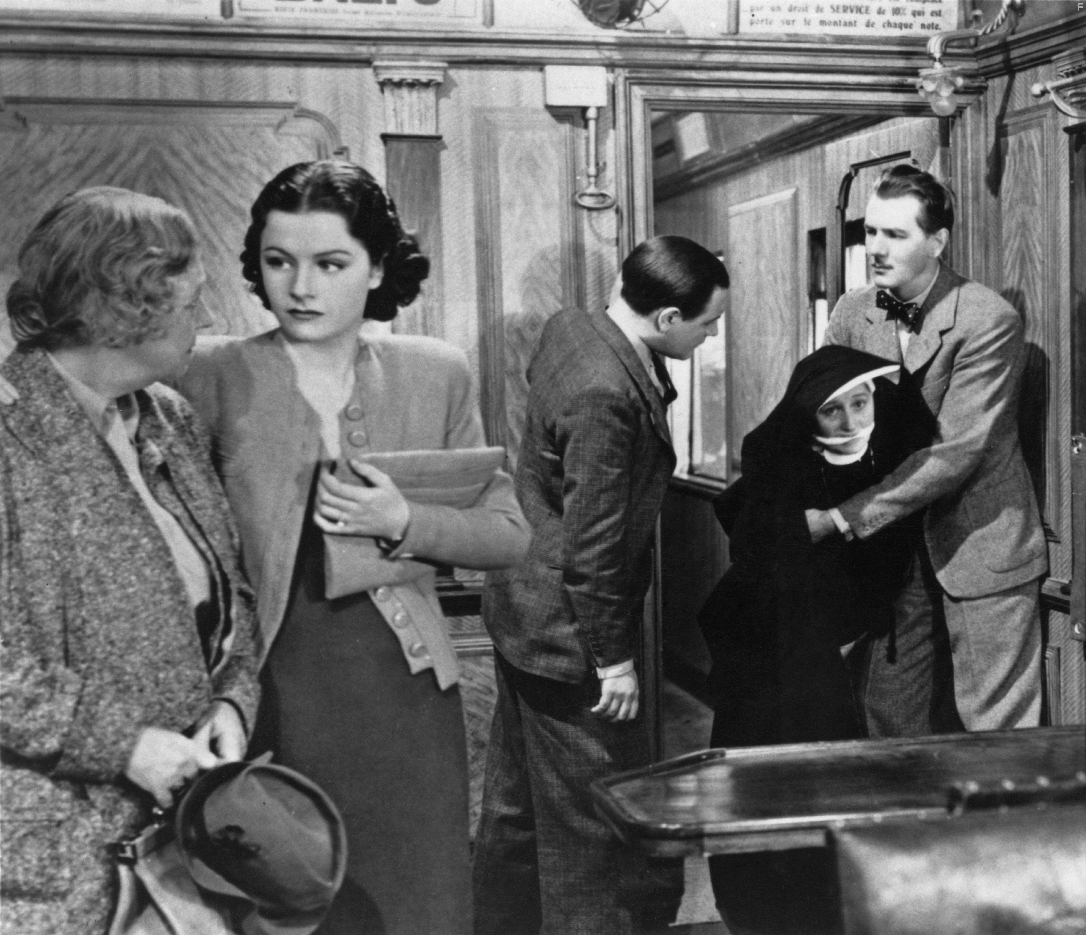 Catherine Lacey, Margaret Lockwood, Michael Redgrave, Naunton Wayne, and Dame May Whitty in Леди исчезает (1938)