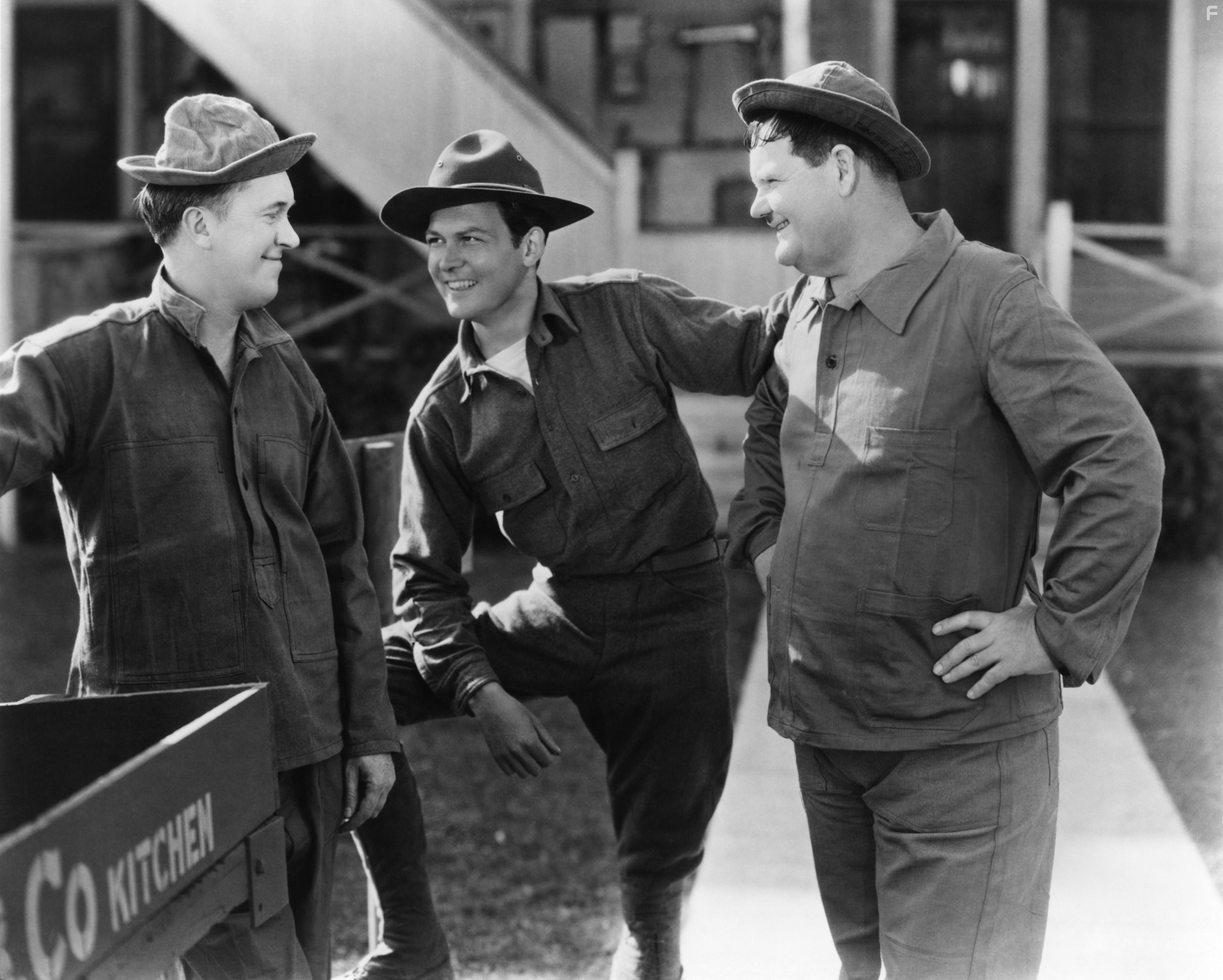 Oliver Hardy, Don Dillaway, and Stan Laurel in Pack Up Your Troubles (1932)