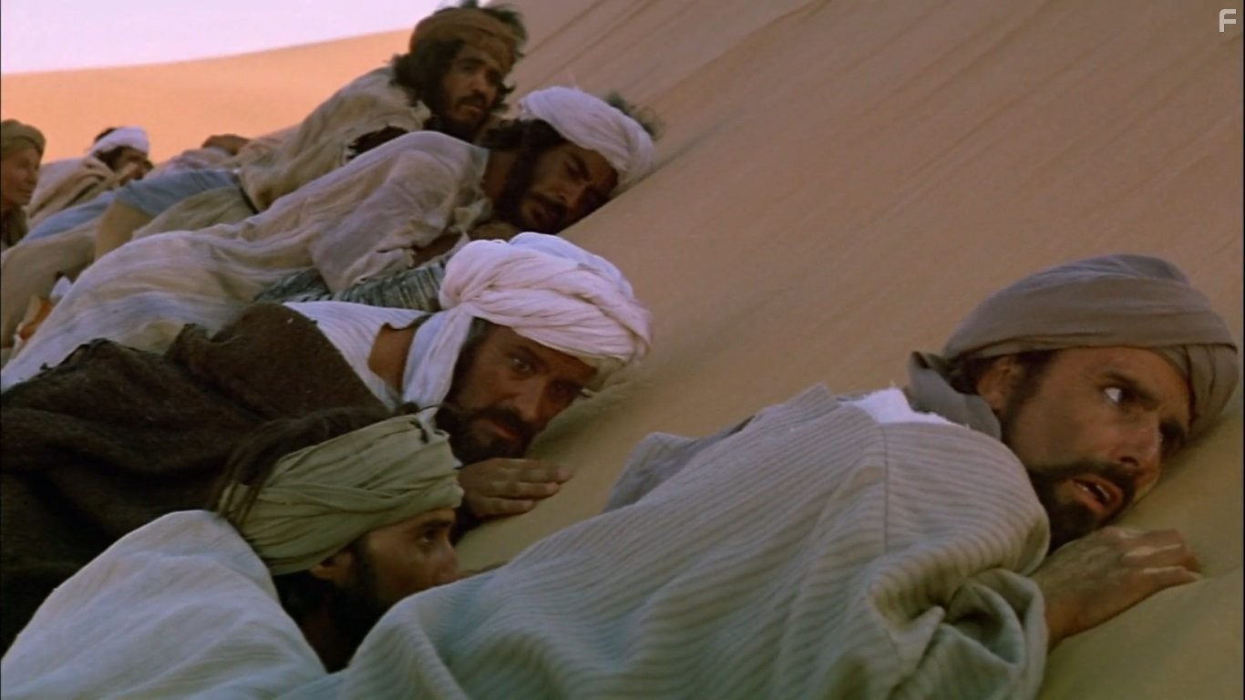 Ronald Chenery and Neville Jason in Послание (1976)