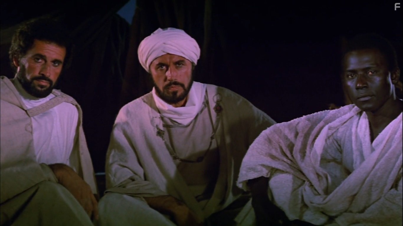 Michael Ansara, Michael Forest, and Johnny Sekka in Послание (1976)