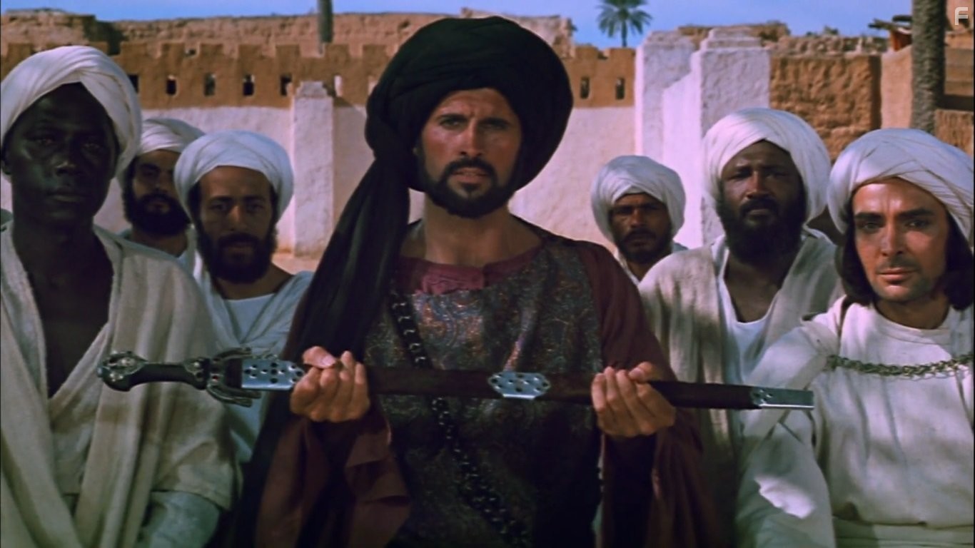 Michael Forest, Johnny Sekka, and Damien Thomas in Послание (1976)