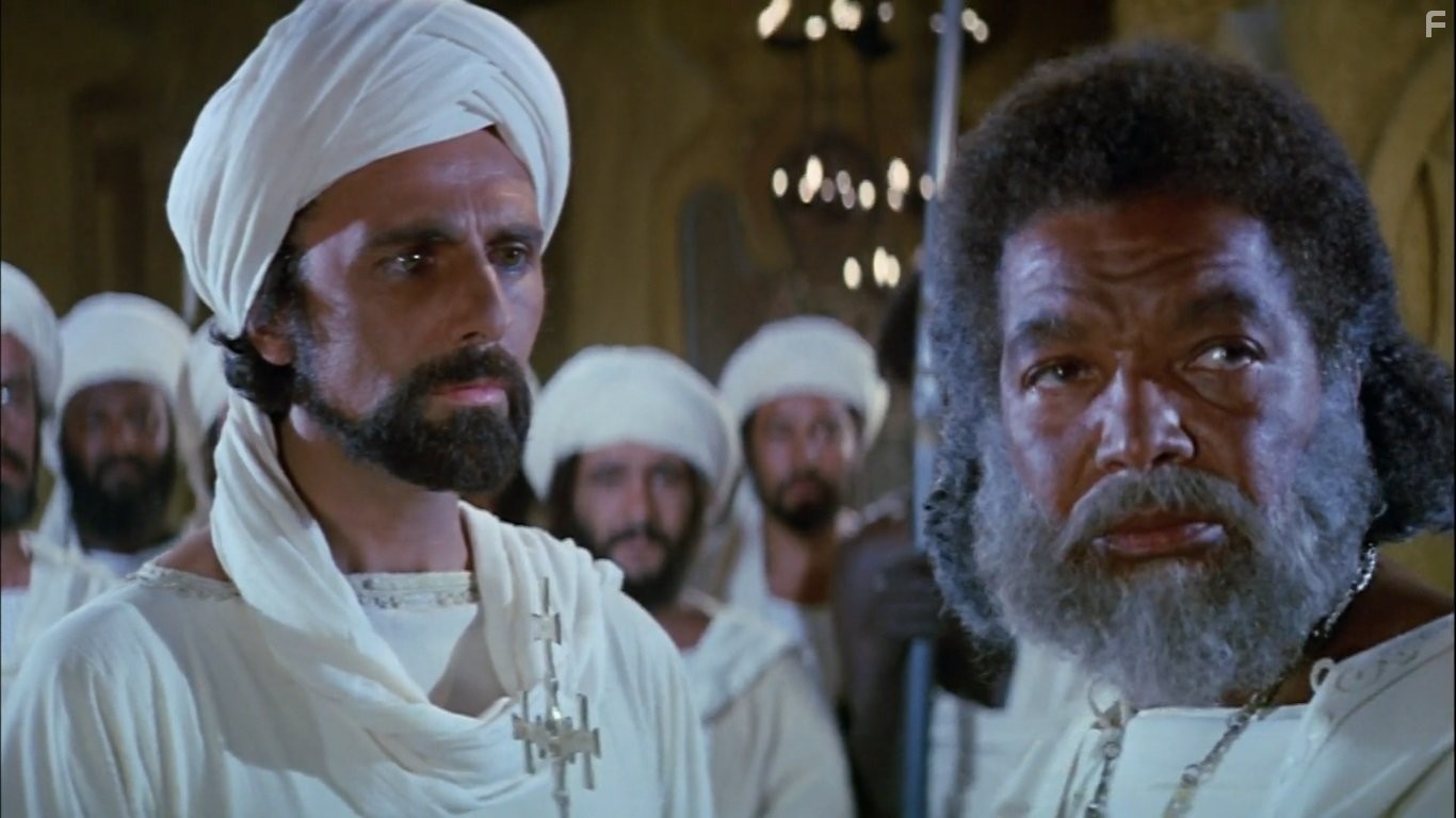 Earl Cameron and Neville Jason in Послание (1976)