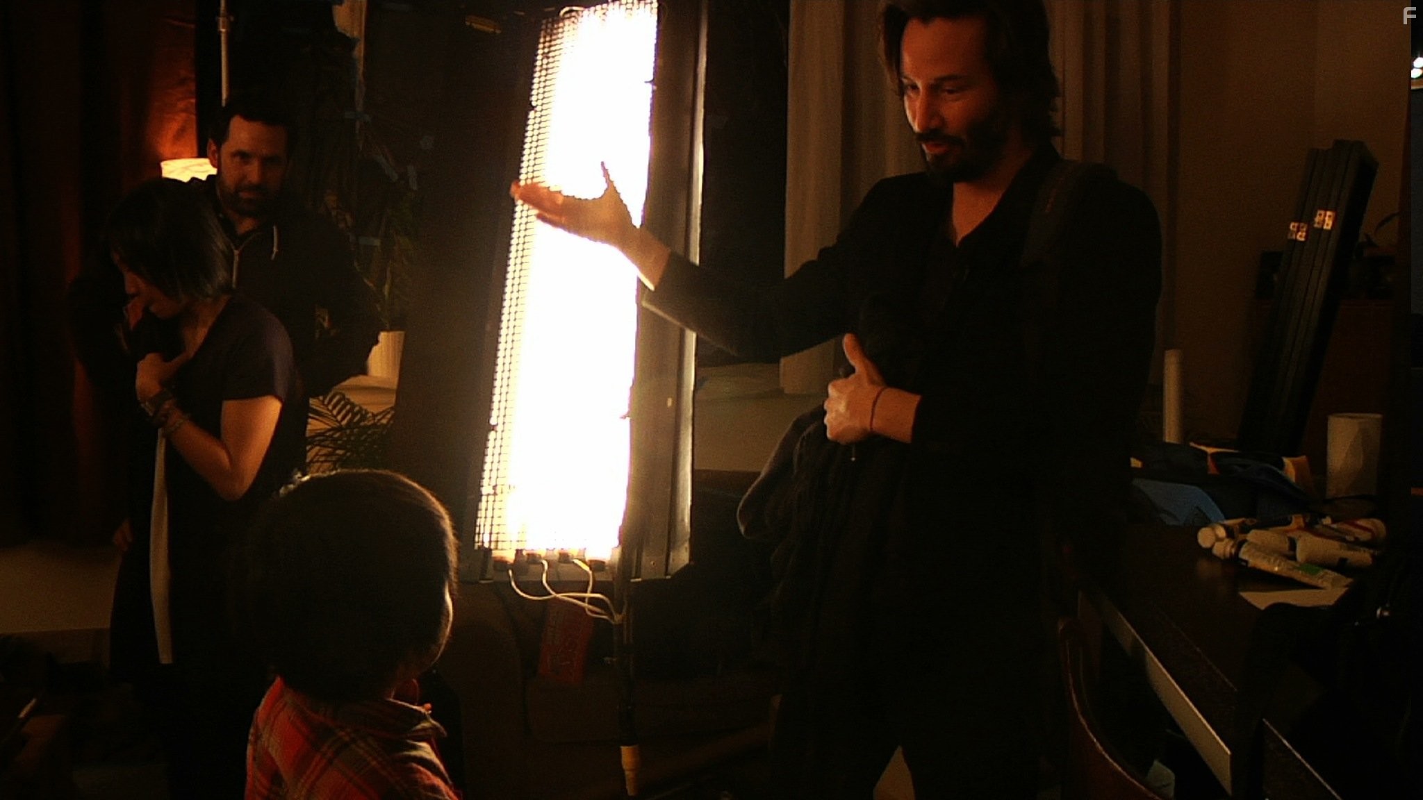 Keanu Reeves and Brennan-Pierson Wang in Бок о бок (2012)