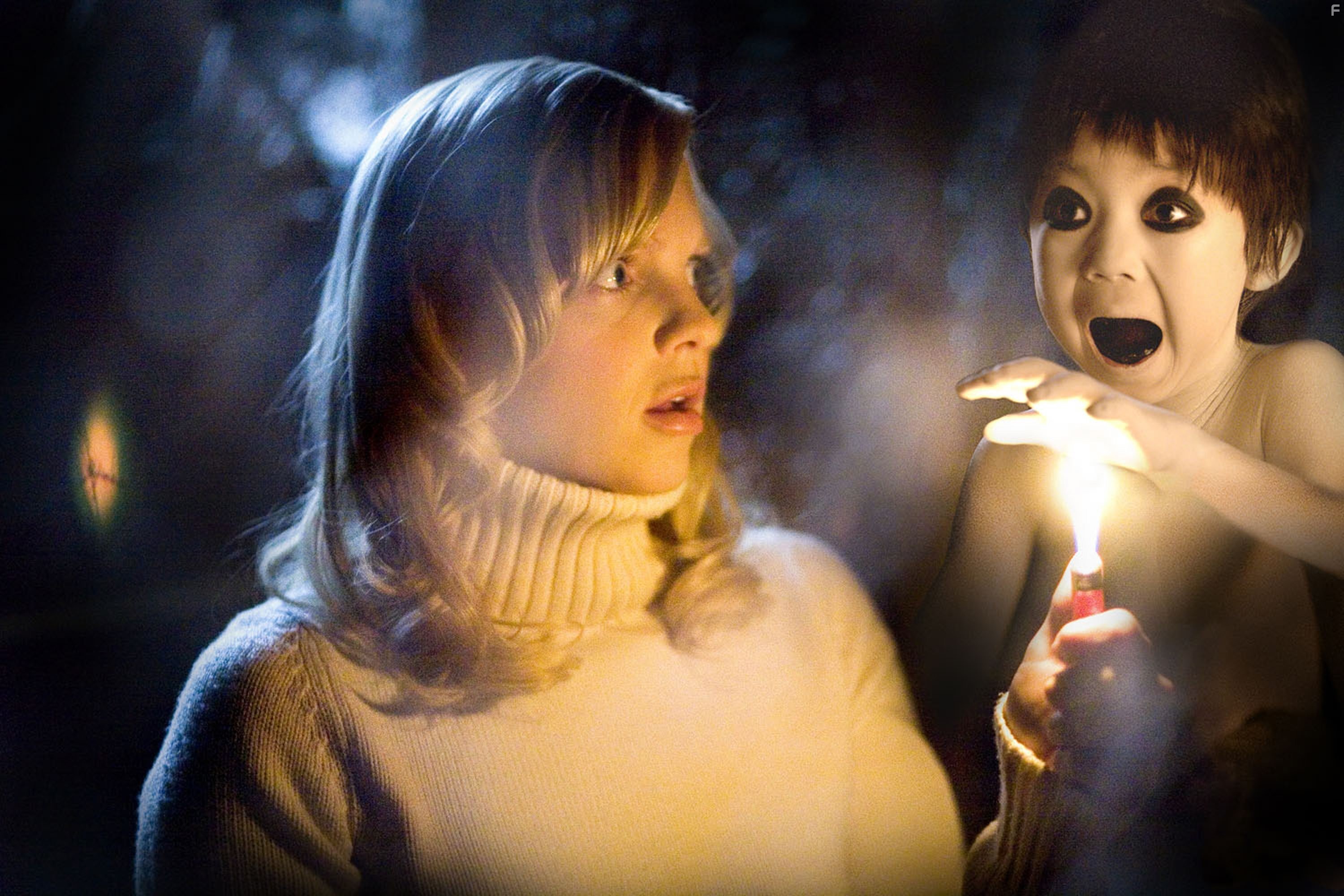 Anna Faris and Garrett Masuda in Очень страшное кино 4 (2006)