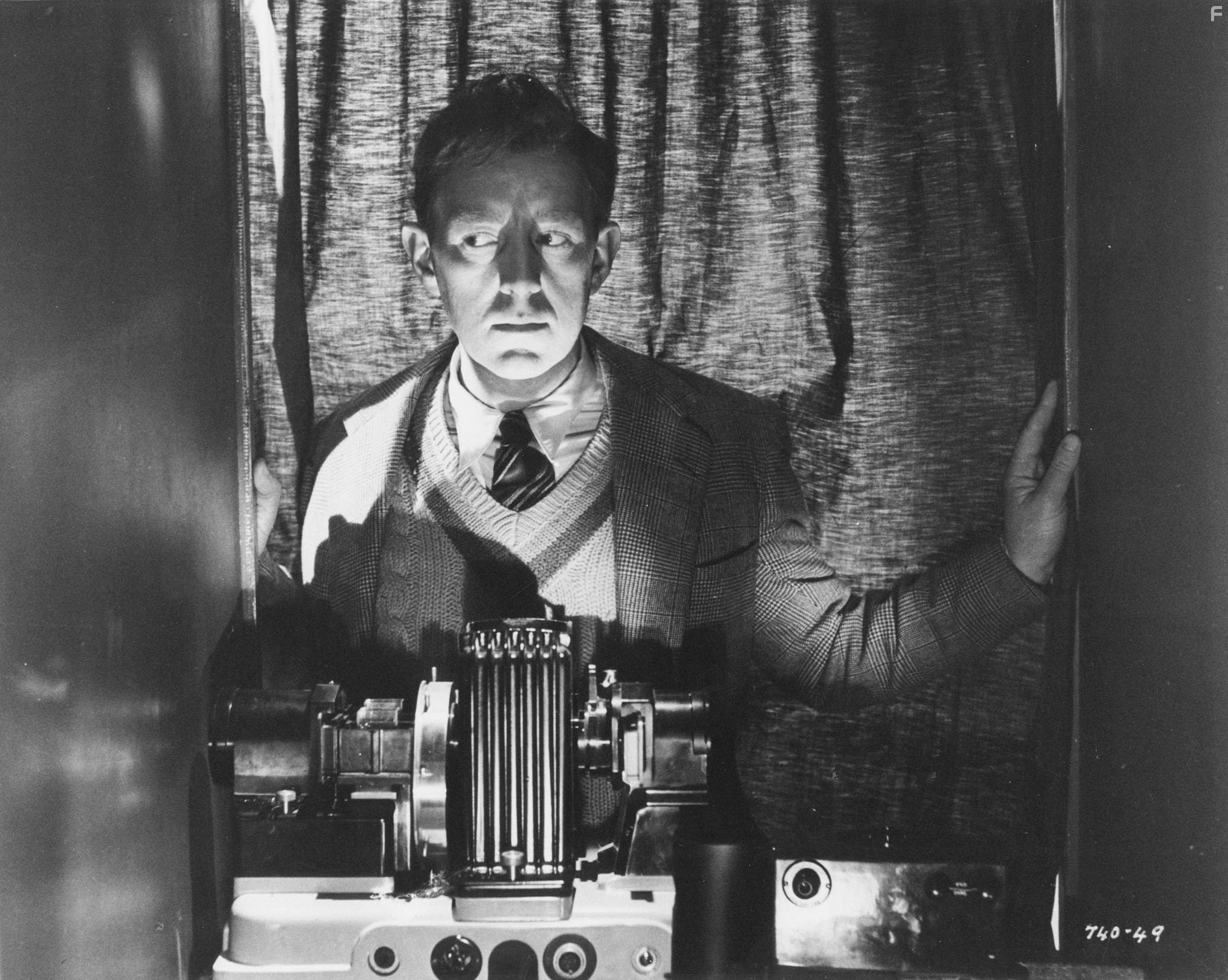 Alec Guinness in Чeловек в белом костюме (1951)