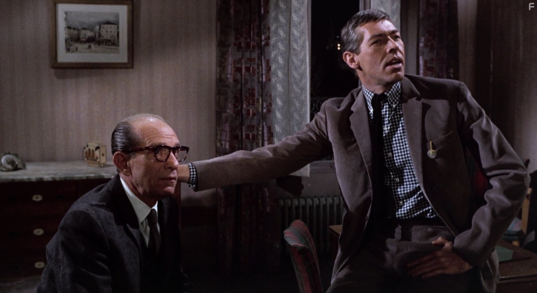 James Coburn in Шарада (1963)