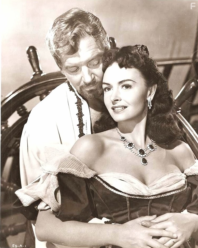 Donna Reed and John Payne in Raiders of the Seven Seas (1953)
