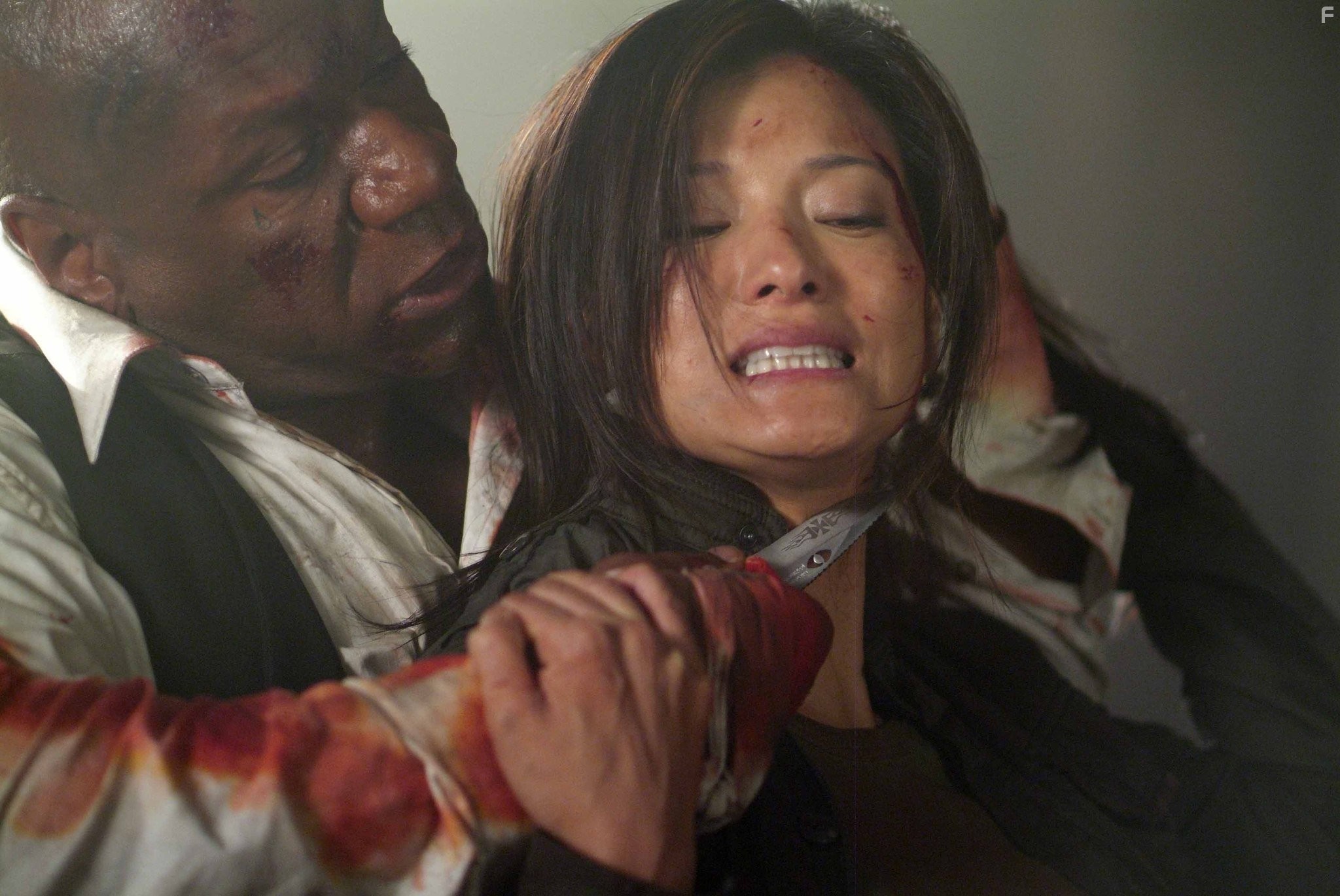 Ving Rhames and Kelly Hu in Турнир на выживание (2009)