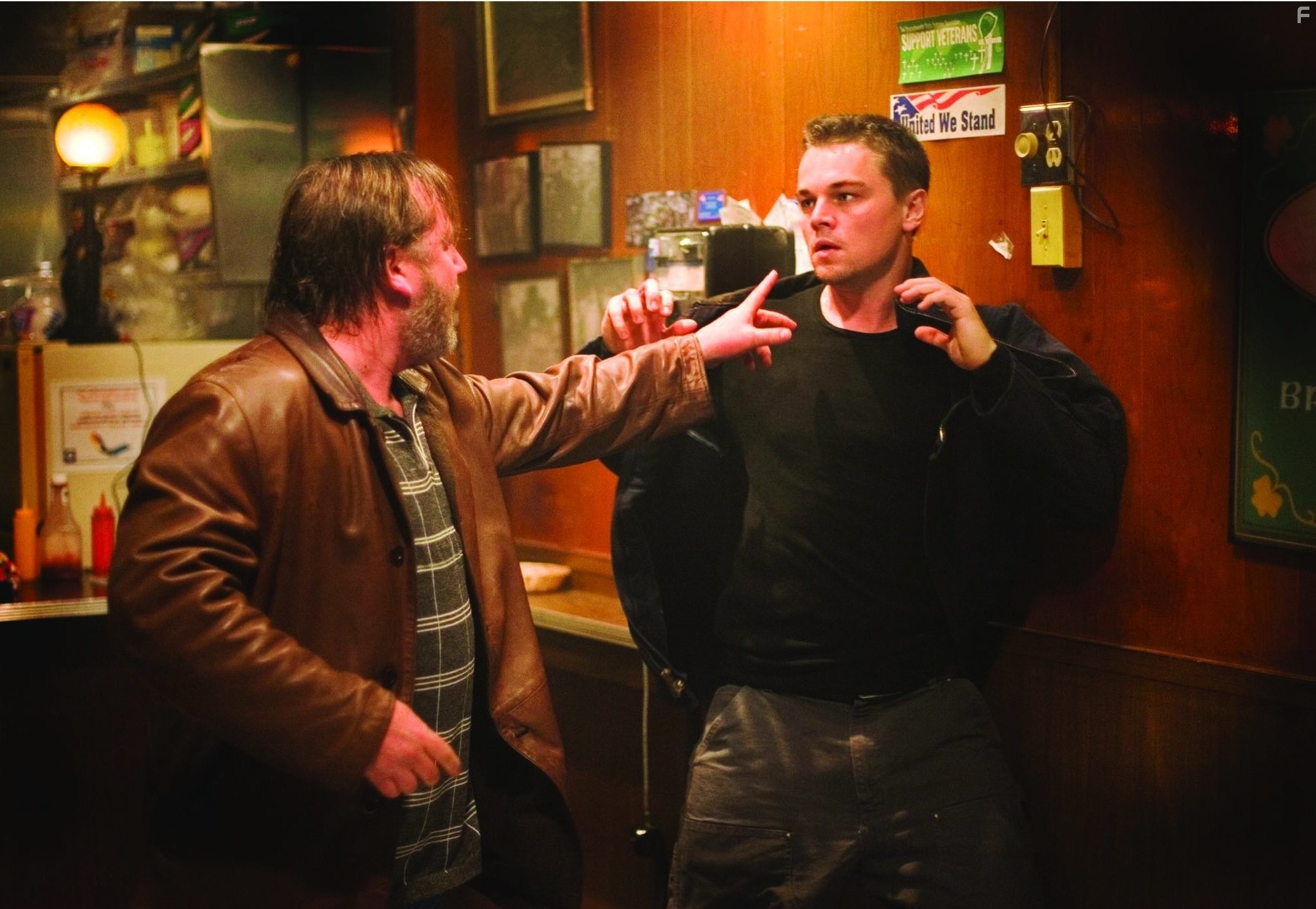 Leonardo DiCaprio and Ray Winstone in Отступники (2006)