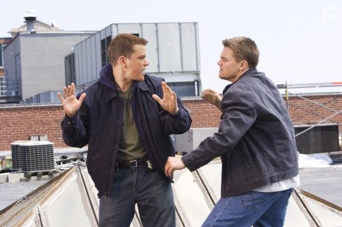 Leonardo DiCaprio and Matt Damon in Отступники (2006)