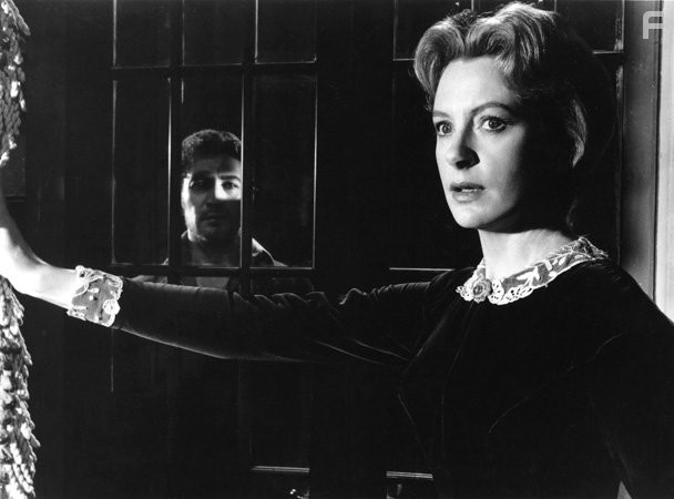 Deborah Kerr and Peter Wyngarde in Невинные (1961)
