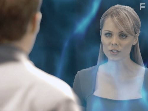Laura Vandervoort in Vизитeры (2009)