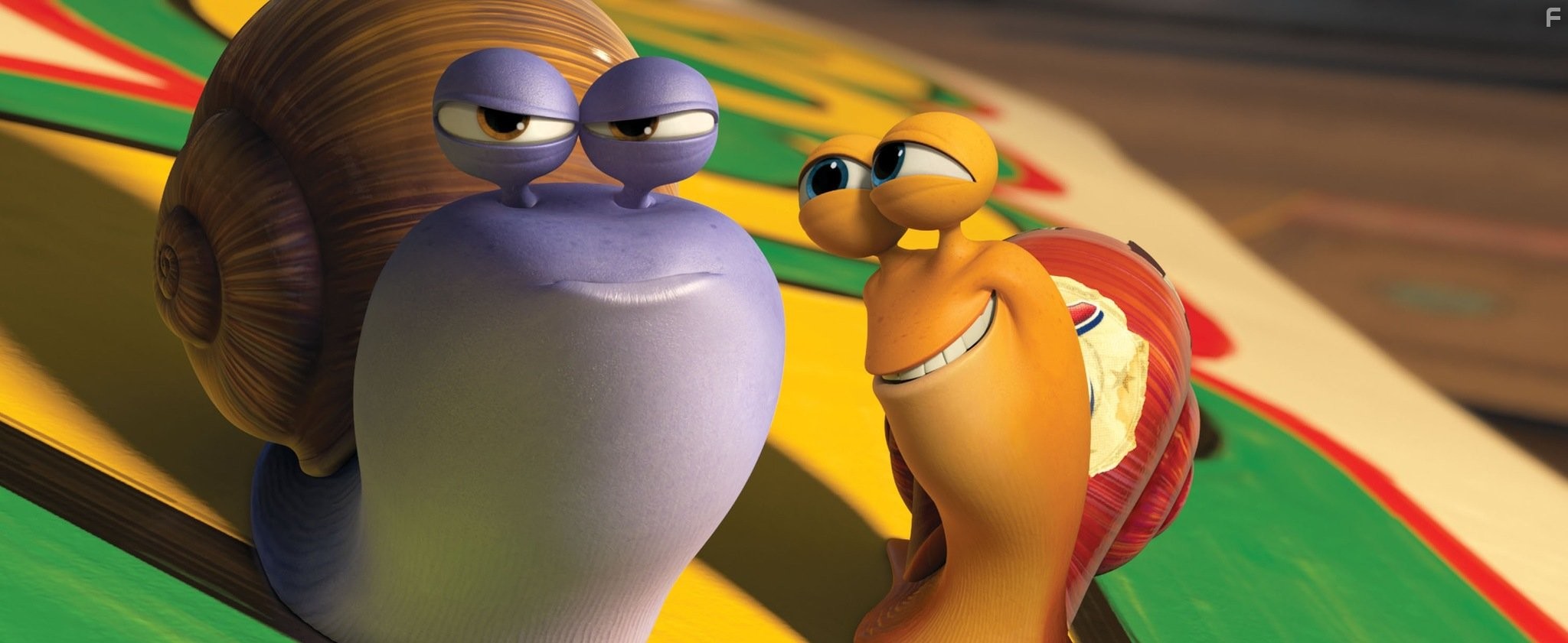 Chet (left, voiced by Paul Giamatti) is the older brother - and voice of reason - to Turbo (Ryan Reynolds), an underdog snail whose dreams suddenly kick into overdrive.