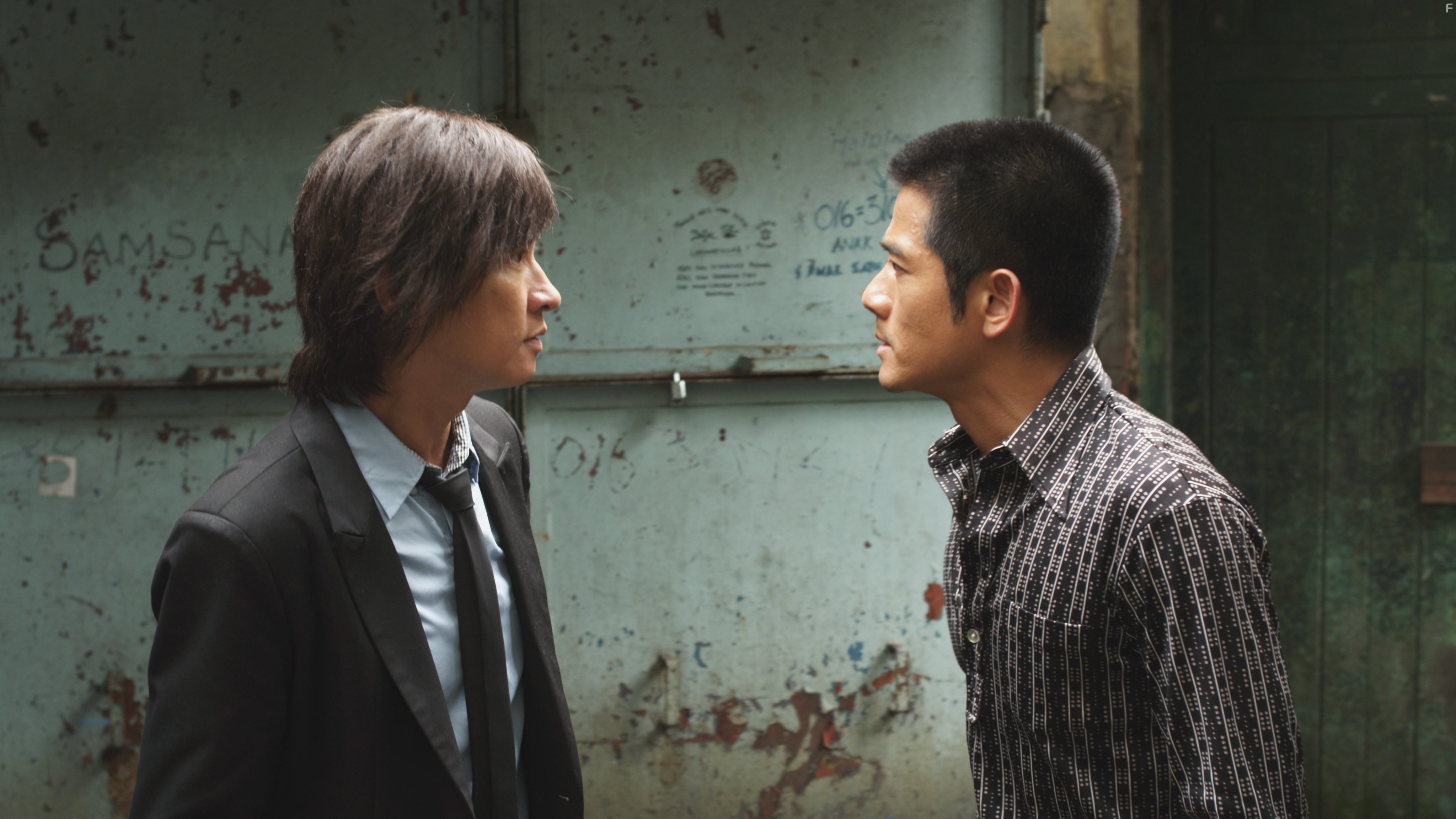 Nick Cheung and Aaron Kwok in Conspirators (2013)