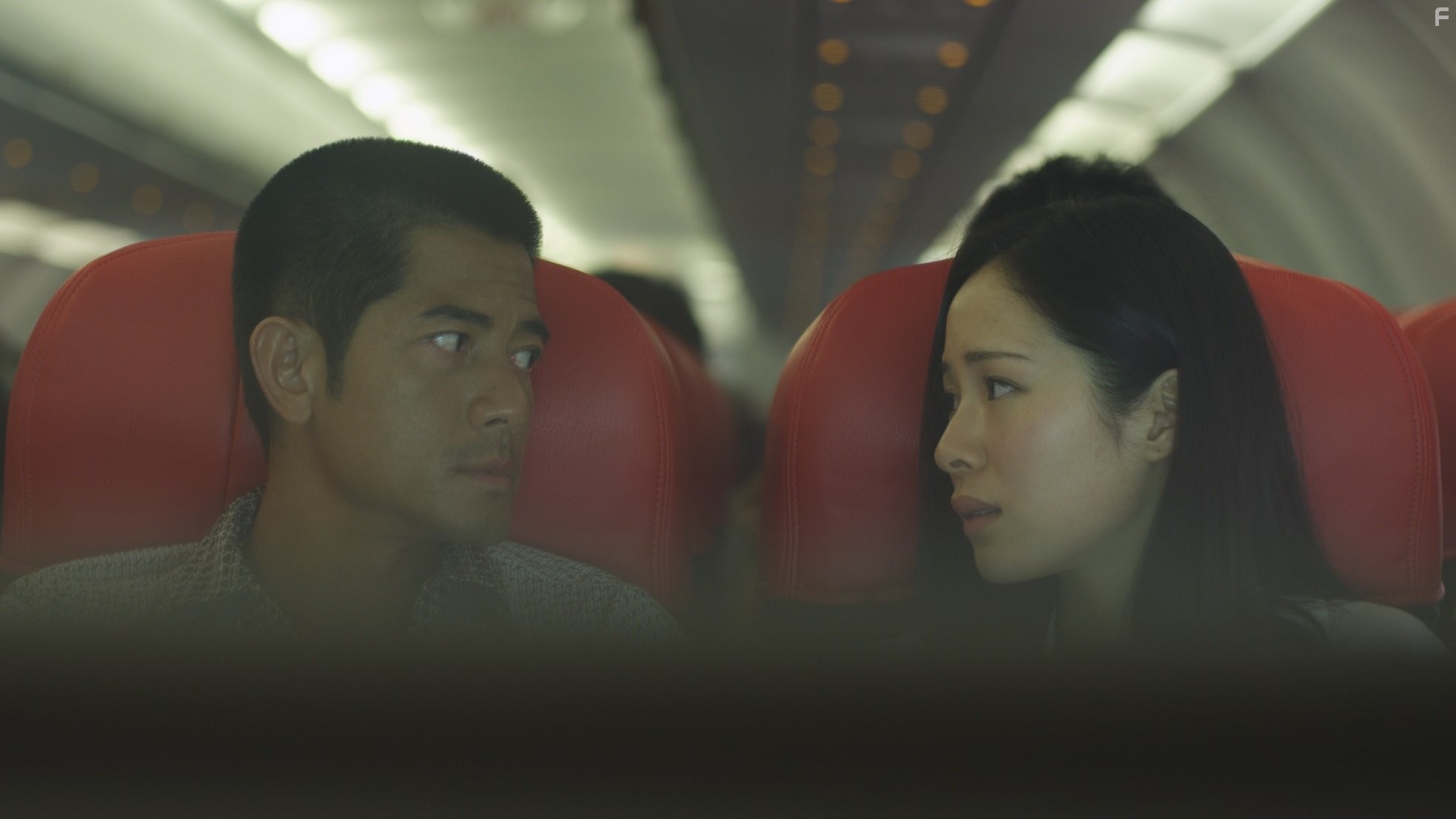 Aaron Kwok and Yi Yan Jiang in Conspirators (2013)
