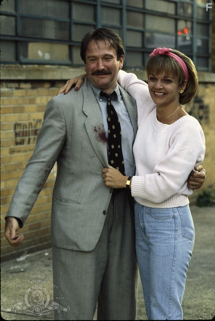 Robin Williams and Pamela Reed in Человек-Кадиллак (1990)