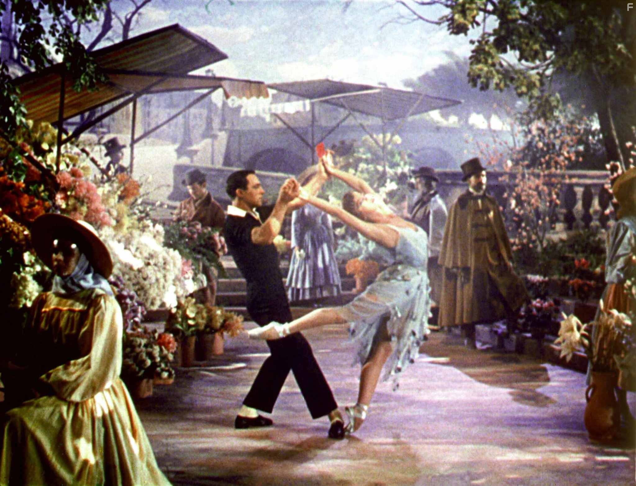 Gene Kelly and Leslie Caron in Американец в Париже (1951)