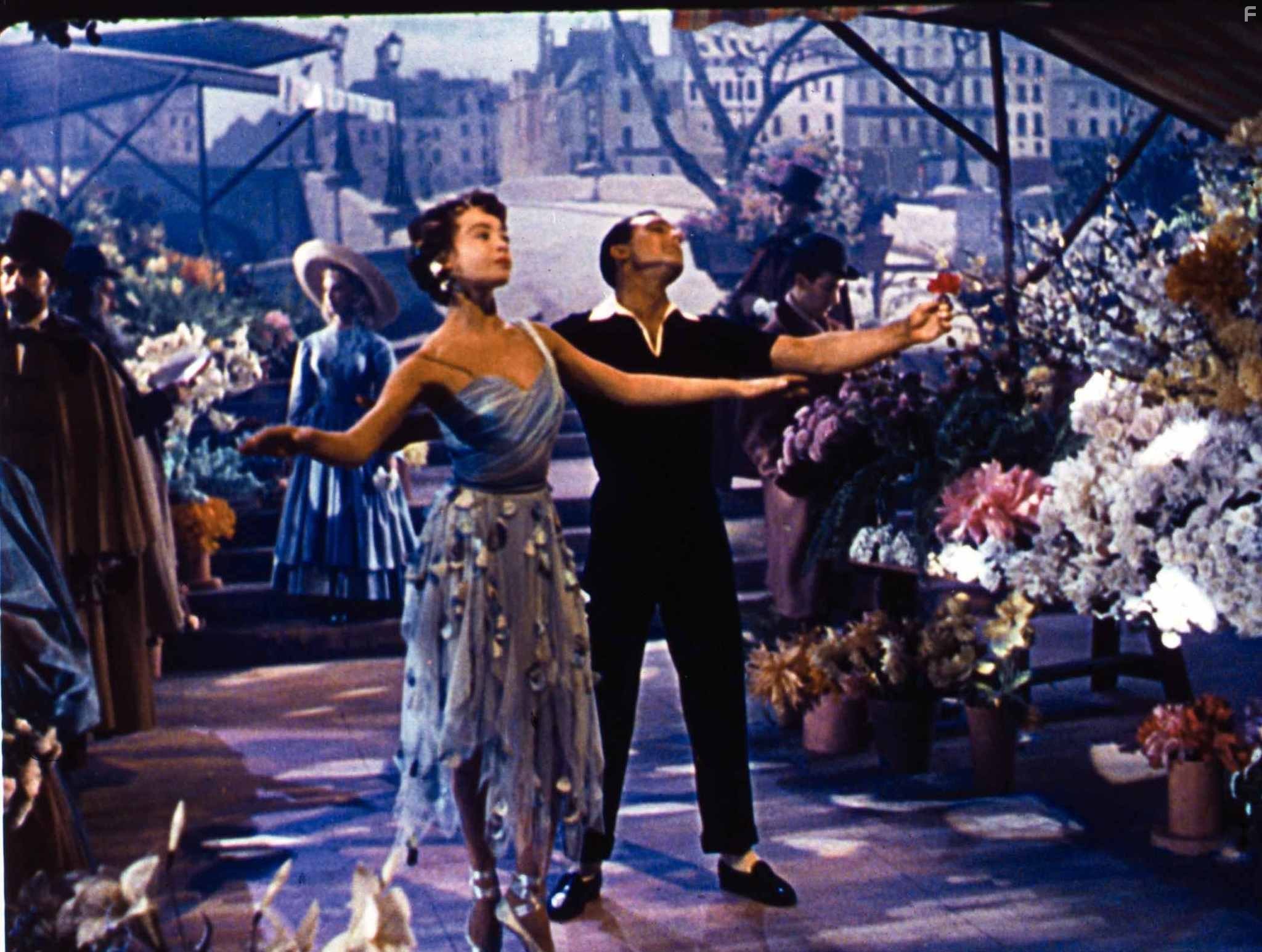Gene Kelly and Leslie Caron in Американец в Париже (1951)