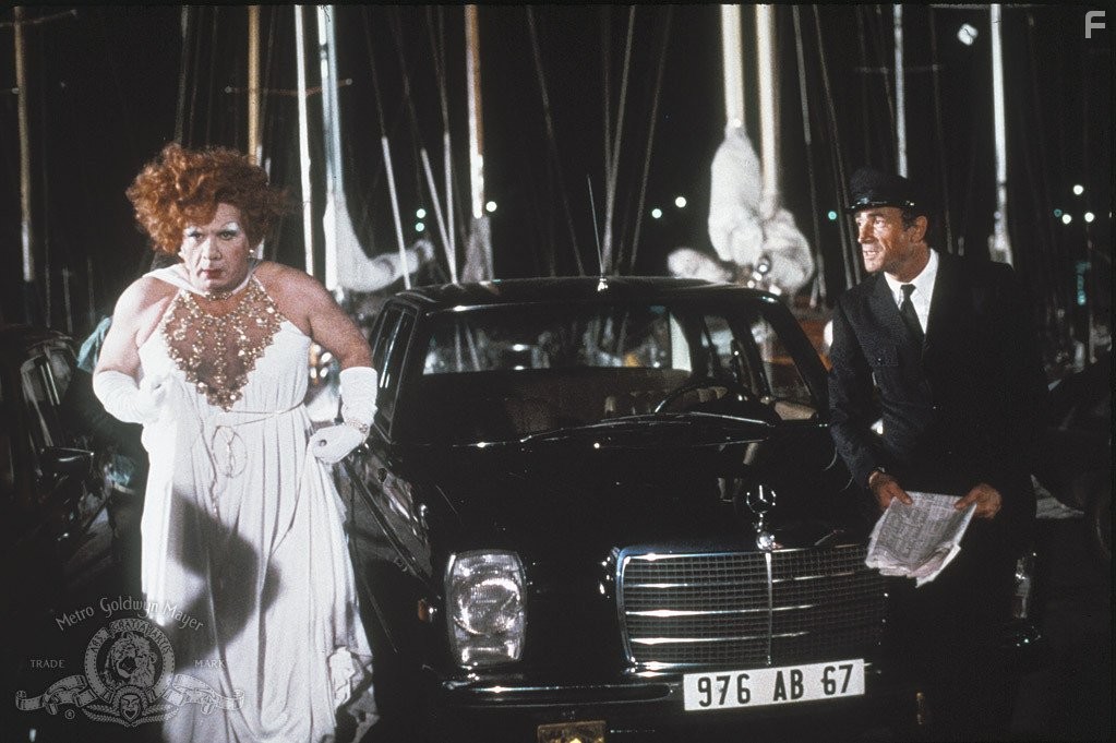 Michel Galabru and Venantino Venantini in Клетка для чудаков (1978)