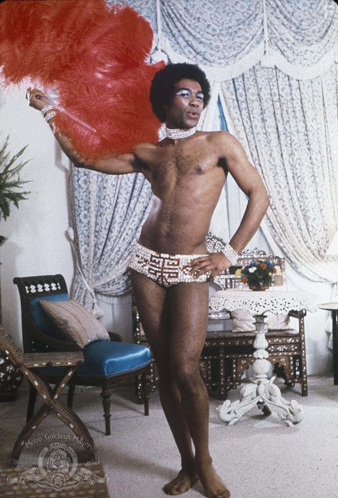 Benny Luke in Клетка для чудаков (1978)