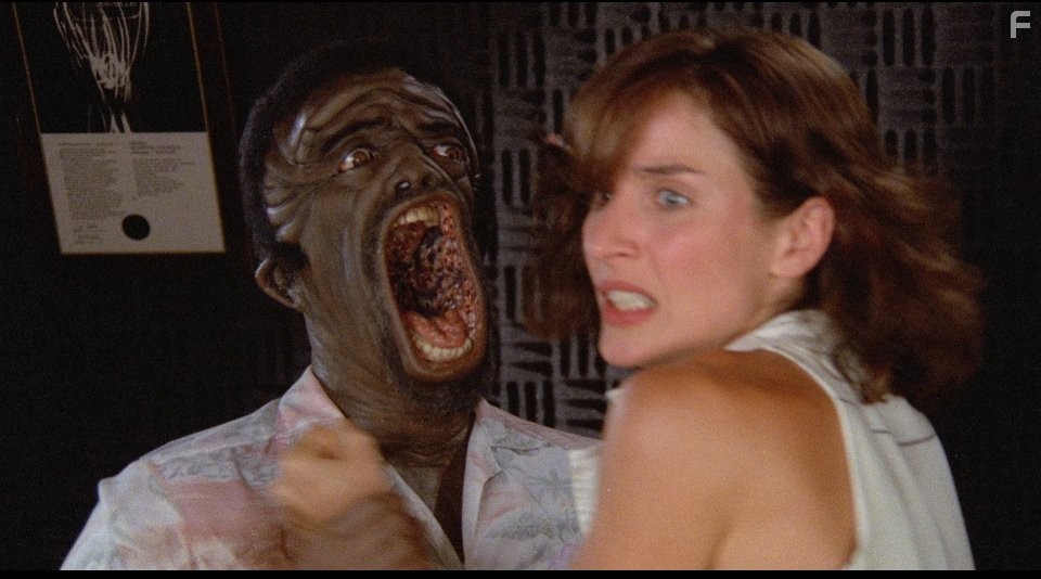 Andrea Marcovicci and Garrett Morris in Вкусная дрянь (1985)