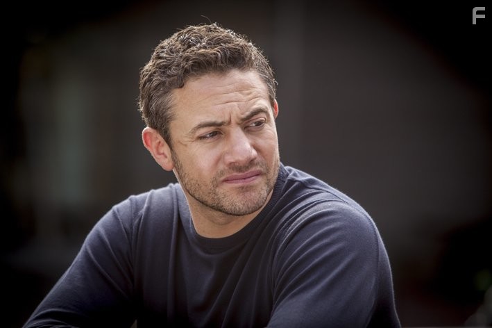 Warren Brown in By Any Means (2013)