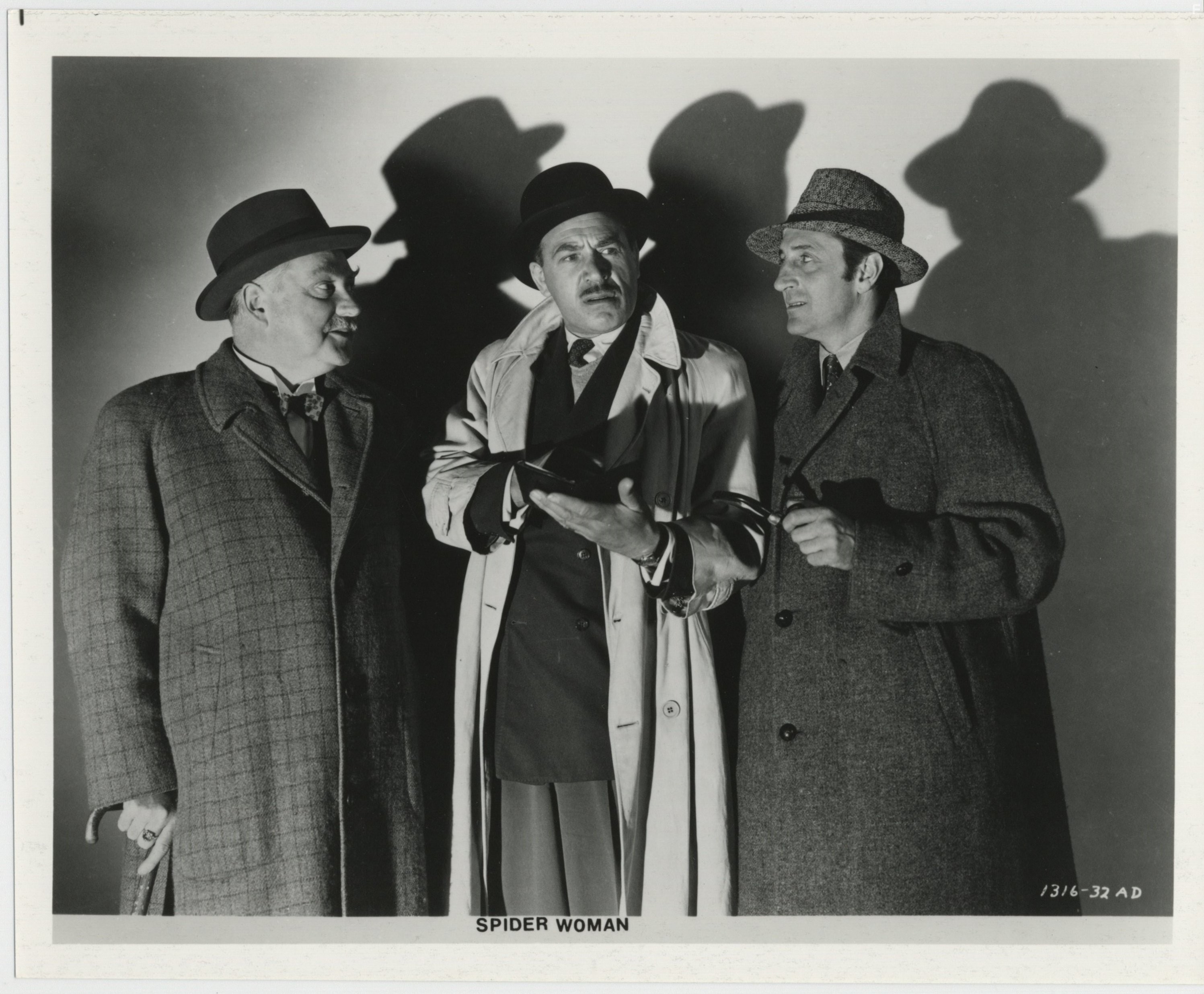 Basil Rathbone, Nigel Bruce, and Dennis Hoey in Паучиха (1944)